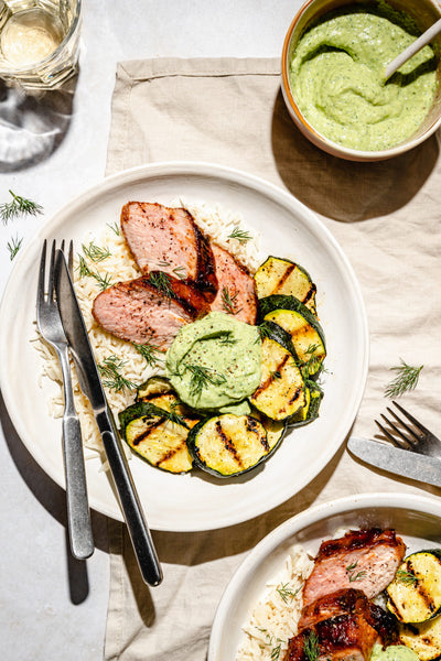 NEW BBQ Glazed Pork Tenderloin served with Rice, Grilled Zucchini and Avocado Crema (GF)