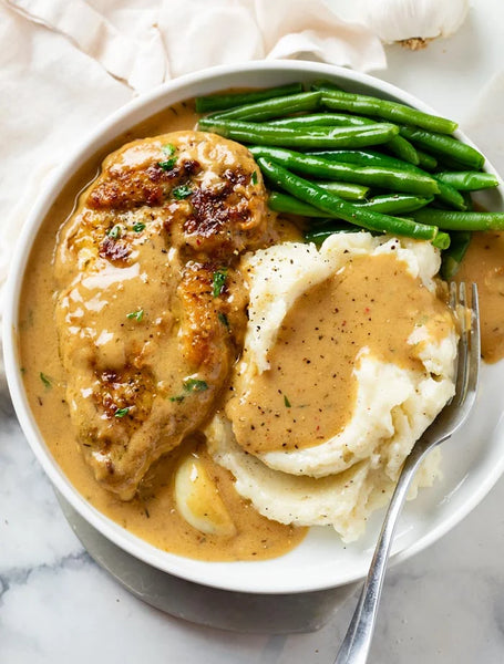 Monday- NEW Creamy Garlic Chicken served with Mashed Potatoes and Green Beans