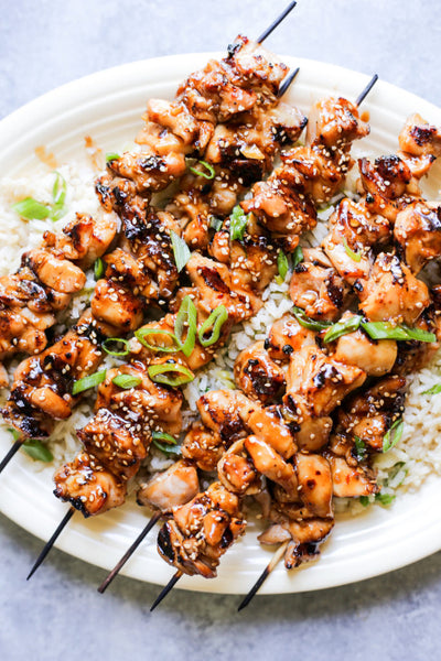 NEW The Defined Dish Grilled Sesame Chicken Skewers served with Ginger Scallion Rice