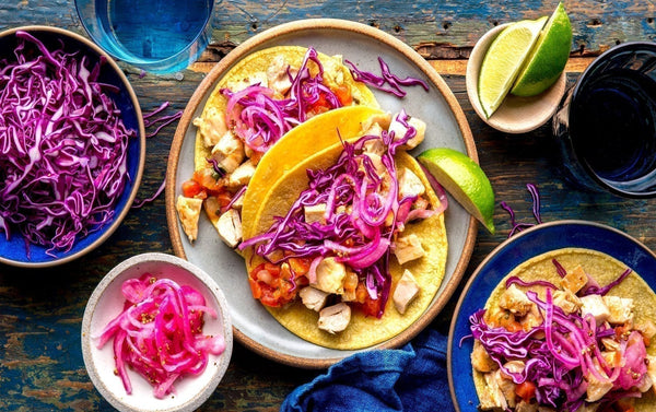 Chicken Adobo Tacos with Pickled Red Onion, coleslaw and sour cream