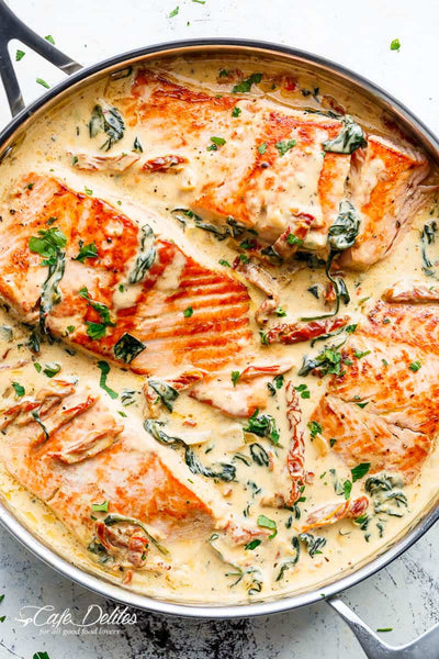 Creamy Garlic Tuscan Salmon served with Roasted Sweet or Yellow Potatoes (GF)