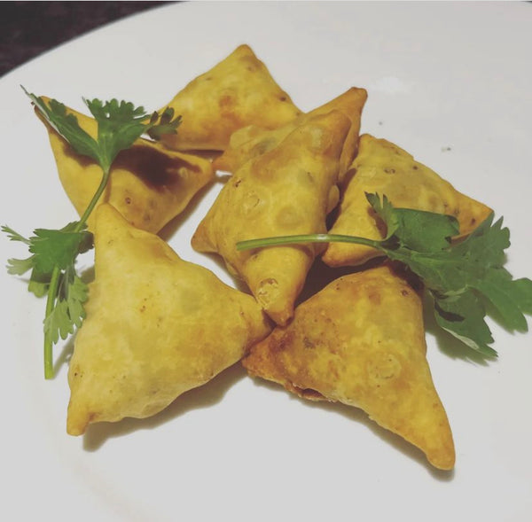 NEW Choice of two Desi Samosas (appetizer size) with dipping sauce