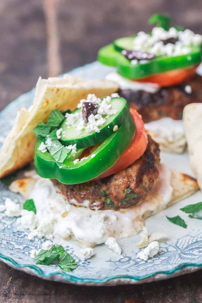 The Naked Greek Beef Burger served with Loaded Potatoes