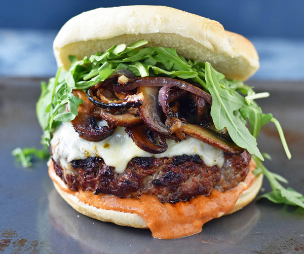 New- Shroom Burger with Caramelized onion, mushrooms, arugula with honey dijon sauce served with Citrus Herbed Fries