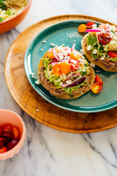 New-Crispy Bean Tostada with Homemade Guacamole and Jicama Slaw topping