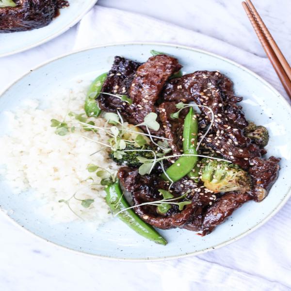 The Defined Dish's Crispy Ginger Beef and Broccoli Stir Fry served with choice of RIce