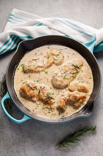 Creamy Dijon Rosemary Chicken served with Baked Parmesan Potato Wedges