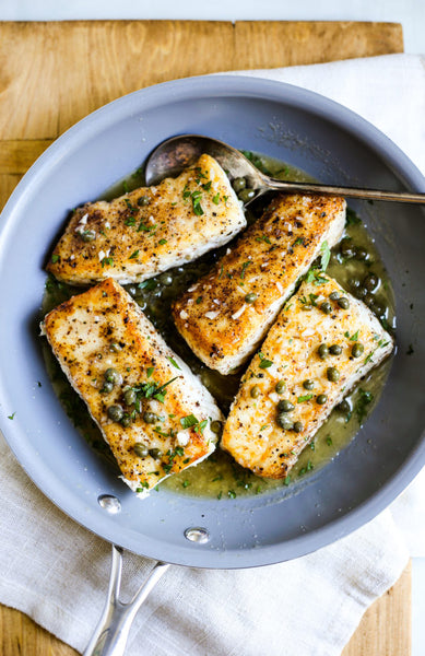 The Defined Dish's Halibut Piccata served with Lemon and Garlic Broccolini