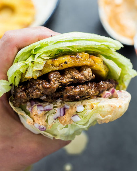 New Beef and Pineapple Burgers with Chipotle Aioli served in lettuce with Sautéed Spicy Garlic Kale